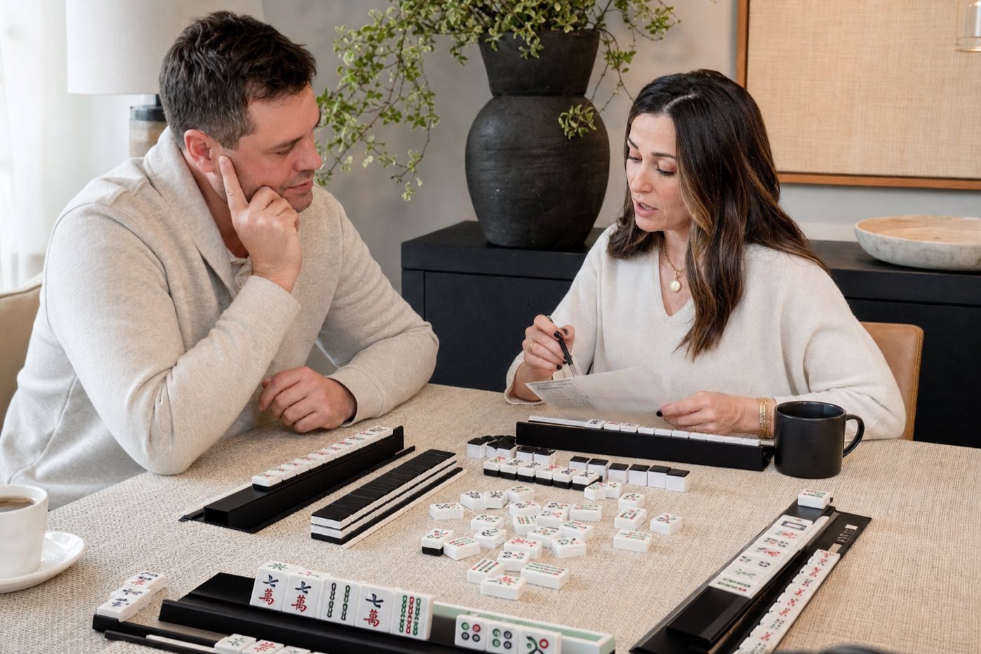 American mahjong beginners learning with racks and a card